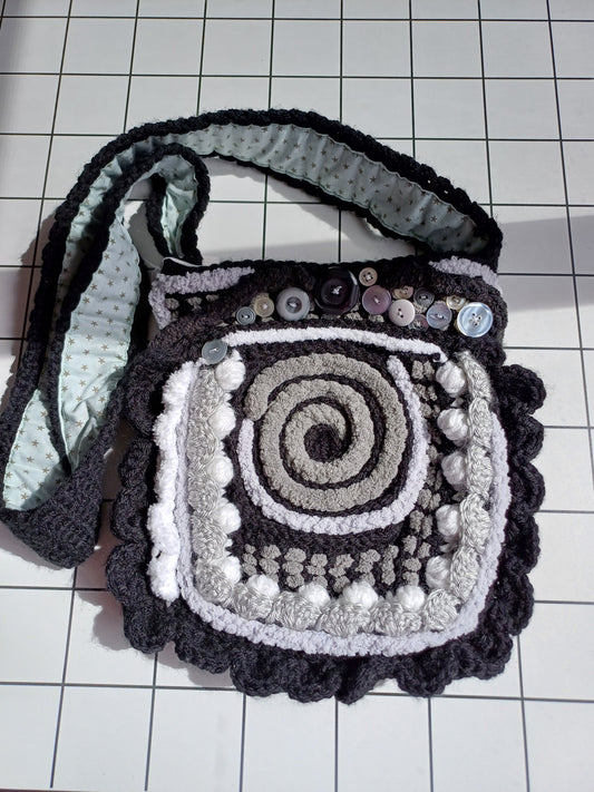 Black and white freeform crochet bag